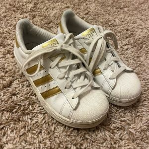 Girls size 12 gold stripe Adidas Superstars